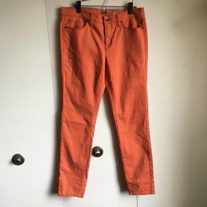 JC Penney orange skinny jeans